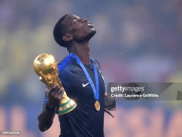 Paul Pogba of France celebrates with the World Cup Trophy following the 2018 FIFA World Cup Russia Final between France and Croatia at Luzhniki...