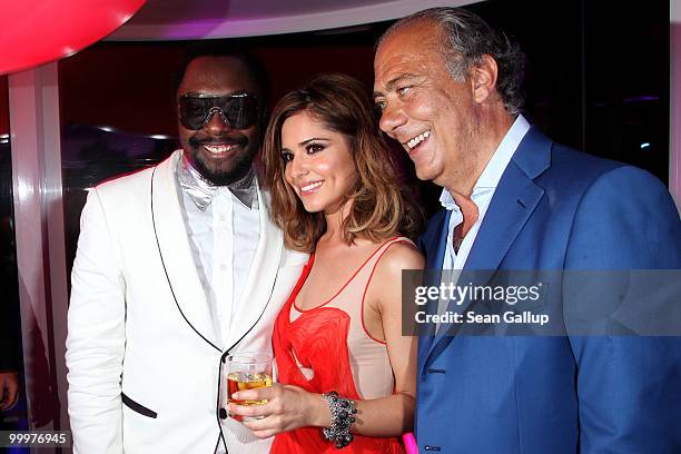 Will.i.am, Cheryl Cole and Fawaz Gruosi attend the de Grisogono Party at the Hotel Du Cap on May 18, 2010 in Cap D'Antibes, France.