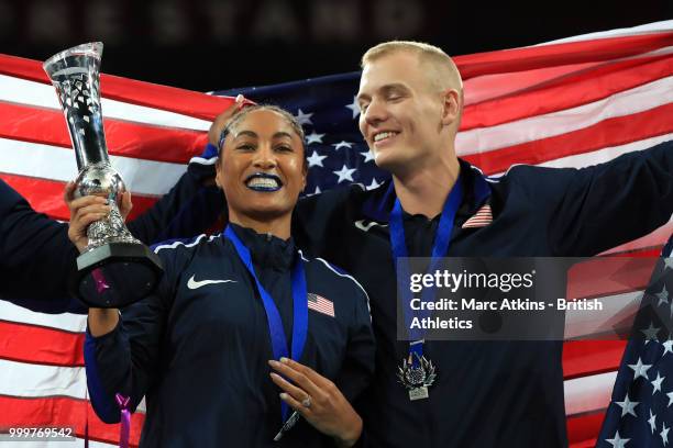 Captain Queen Harrison and Sam Kendricks celebrate with the trophy during Day Two of the Athletics World Cup 2018 presented by Muller at London...