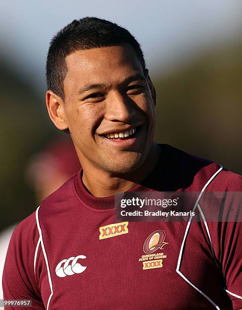 Israel Folau smiles during the Queensland Maroons State of Origin team fans day and training session held at Stockland Park on May 19, 2010 at the...