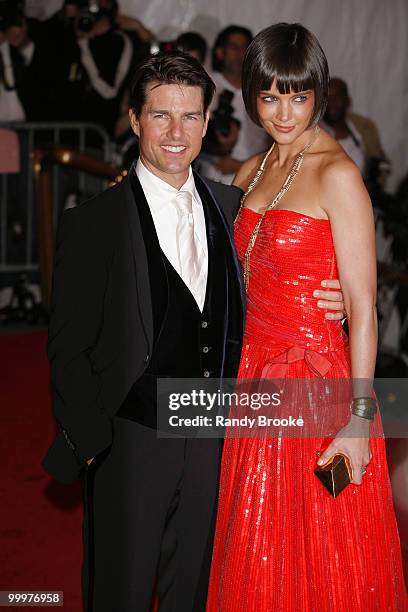 Actors Tom Cruise and Katie Holmes attends the Metropolitan Museum of Art Costume Institute Gala "Superheroes: Fashion And Fantasy" at the...
