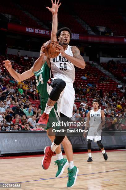 McDaniels of the Portland Trail Blazers goes to the basket against the Boston Celtics during the 2018 Las Vegas Summer League on July 15, 2018 at the...