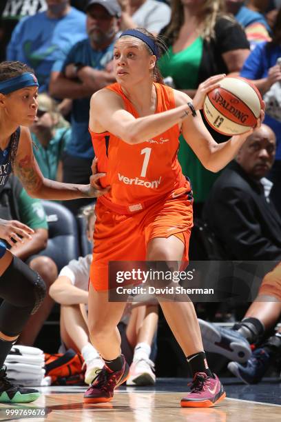 Rachel Banham of the Connecticut Sun handles the ball against the Minnesota Lynx on July 15, 2018 at Target Center in Minneapolis, Minnesota. NOTE TO...