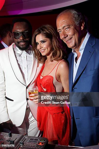 Will.i.am, Cheryl Cole and Fawaz Gruosi attend the de Grisogono Party at the Hotel Du Cap on May 18, 2010 in Cap D'Antibes, France.