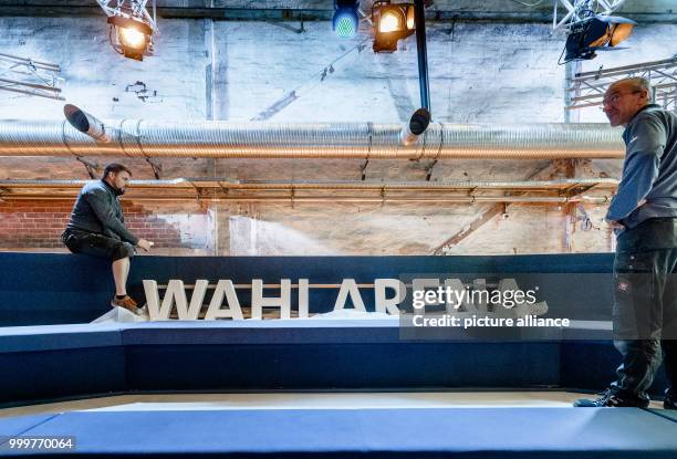 Technicians build up a tv studio in the Kulturwerft Gollan in Luebeck, Germany, 08 September 2017. German Chancellor Merkel will visit the studio for...