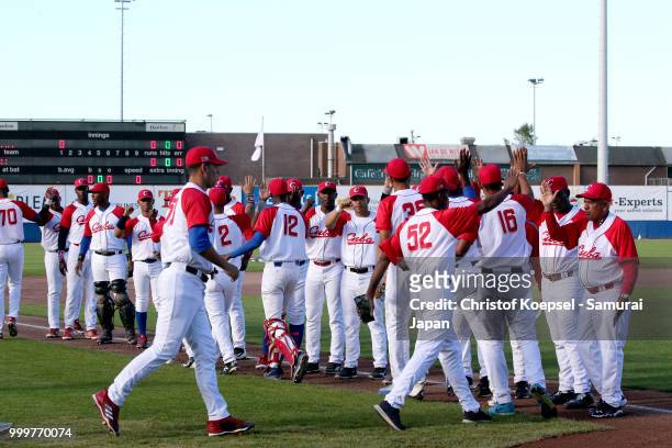 The team of Cuba enters the pitch during the Haarlem Baseball Week game between Cuba and Japan at Pim Mulier Stadion on July 15, 2018 in Haarlem,...