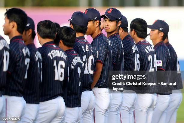 The team of Japan stands for the national anthem prior to the Haarlem Baseball Week game between Cuba and Japan at Pim Mulier Stadion on July 15,...