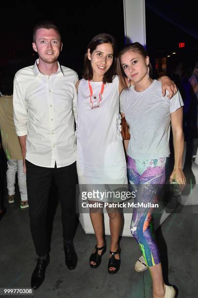 Casey Tucker, Clara Cassan, and Samantha Busiello attend the Parrish Art Museum Midsummer Party 2018 at Parrish Art Museum on July 14, 2018 in Water...