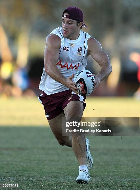Cooper Cronk runs with the ball at the Queensland Maroons State of Origin team fans day and training session held at Stockland Park on May 19, 2010...