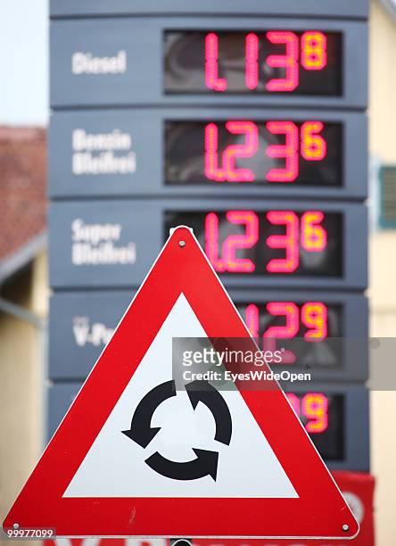 Roundabout sign and prices for petrol shown at a patrol station on May 06, 2010 in Bregenz, Austria. Bregenz is a big european city with more than...