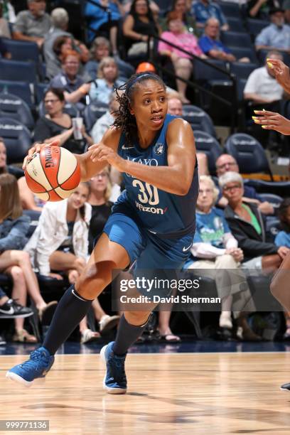 Tanisha Wright of the Minnesota Lynx handles the ball against the Connecticut Sun on July 15, 2018 at Target Center in Minneapolis, Minnesota. NOTE...