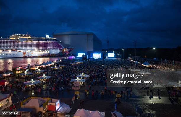 Fans enjoy the concert of rock singer Udo Lindenberg in Papenburg, Germany, 08 September 2017. The musician performed on the grounds of the Meyer...