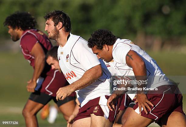 David Taylor runs during a fitness drill at the Queensland Maroons State of Origin team fans day and training session held at Stockland Park on May...