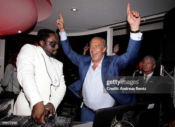 Will I am and Fawaz Gruosi attend the de Grisogono Party at the Hotel Du Cap on May 18, 2010 in Cap D'Antibes, France.