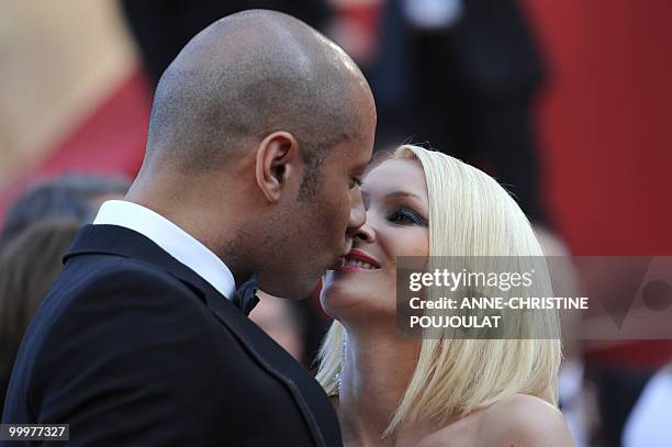 Reality show Secret Story participants Tatiana et Xavier arrive for the screening of "Des Hommes et des Dieux" presented in competition at the 63rd...