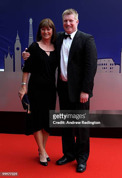 Richard Finch of England and wife Debbie arrive at the 2010 Tour Dinner prior to the BMW PGA Championship on the West Course at Wentworth on May 18,...