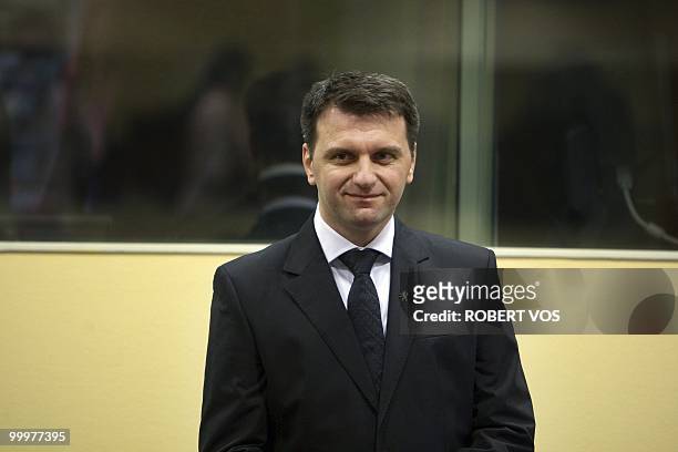 Former Macedonian security services member Johan Tarculovski stands in court at the International Criminal Tribunal for the former Yugoslavia in the...