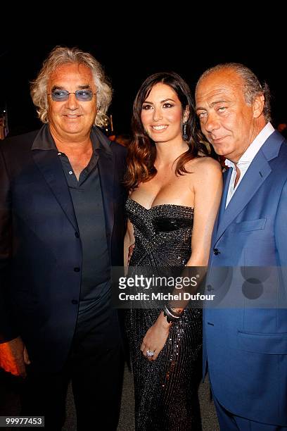 Flavio Briatore, Elisabetta Briatore and Fawaz Gruosi attend the de Grisogono "Crazy Chic Evening" cocktail party at the Hotel Du Cap Eden Roc on May...