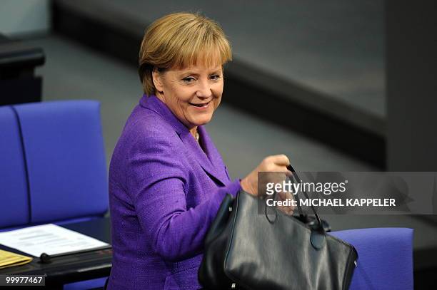 German Chancellor Angela Merkel arrives for a session of the Bundestag on May 19, 2010 in Berlin. Merkel called for a radical overhaul of Europe's...