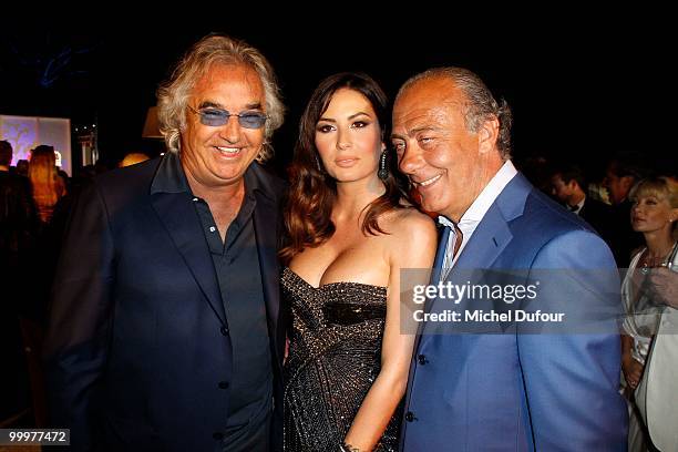 Flavio Briatore, Elisabetta Briatore and Fawaz Gruosi attend the de Grisogono "Crazy Chic Evening" cocktail party at the Hotel Du Cap Eden Roc on May...