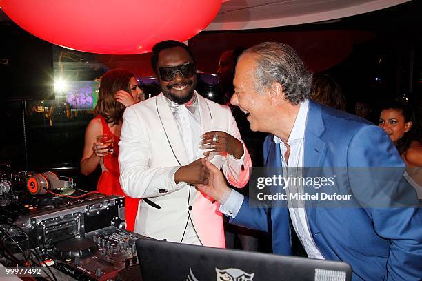 Will.i.am and Fawaz Gruosi attend the de Grisogono "Crazy Chic Evening" cocktail party at the Hotel Du Cap Eden Roc on May 18, 2010 in Antibes,...