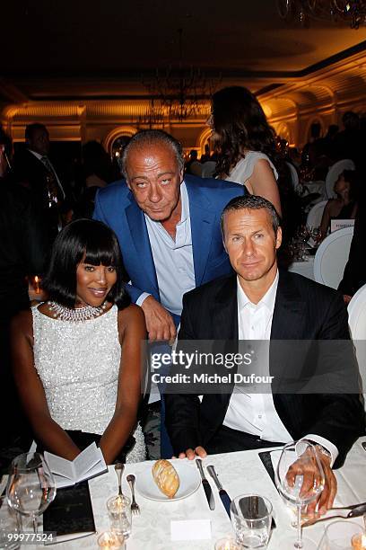 Fawaz Gruosi, Naomi Campbell and Vladislav Doronin attend the de Grisogono "Crazy Chic Evening" cocktail party at the Hotel Du Cap Eden Roc on May...