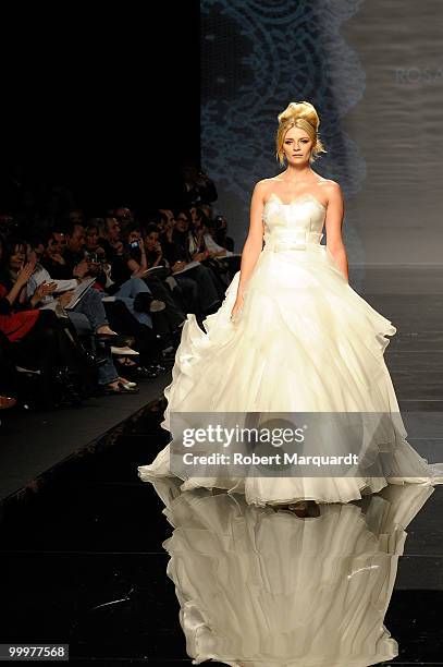 Mischa Barton presents a creation from Rosa Clara's latest bridal collection 2011, at the Fira 2 Barcelona on May 18, 2010 in Barcelona, Spain.