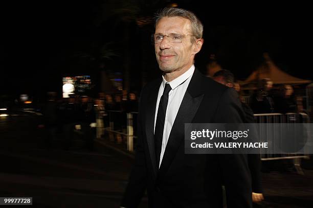 French actor Lambert Wilson leaves after the screening of "Des Hommes et des Dieux" presented in competition at the 63rd Cannes Film Festival on May...