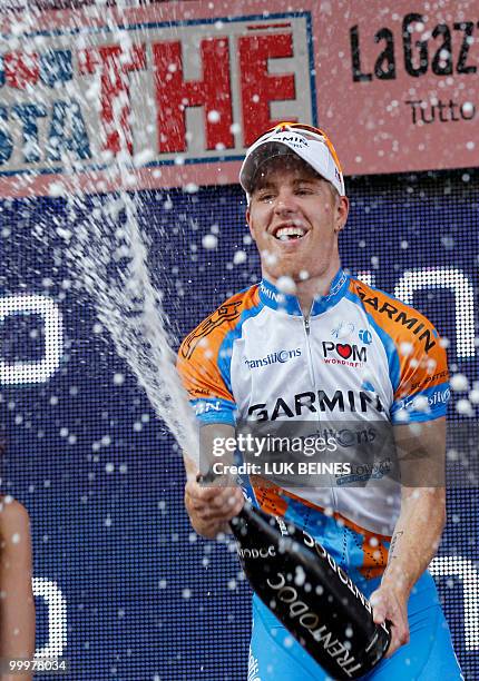 Tyler Farrar celebrates on the podium after winning the tenth stage of the 93rd Giro d'Italia going from Avellino to Bitonto in victory on May 18,...