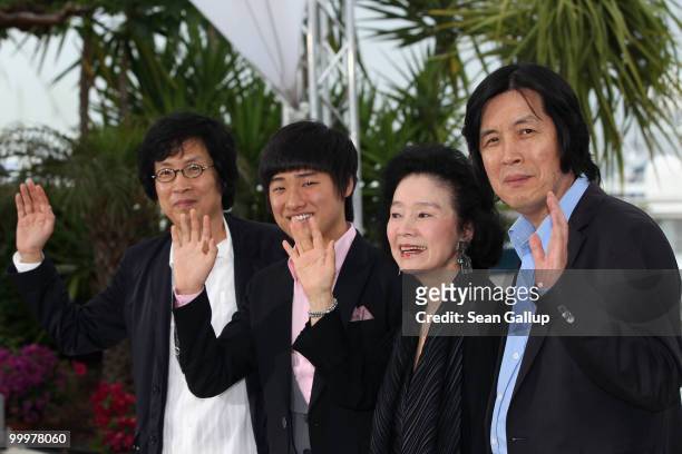 Producer Jun-dong Lee, actor David Lee, actress Yun Jung Hee and director Chang-dong Lee attend the "Poetry" Photocall at the Palais des Festivals...