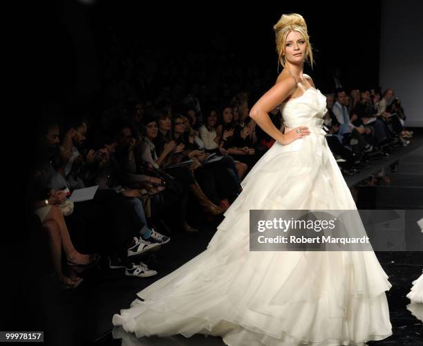 Mischa Barton presents a creation from Rosa Clara's latest bridal collection 2011, at the Fira 2 Barcelona on May 18, 2010 in Barcelona, Spain.