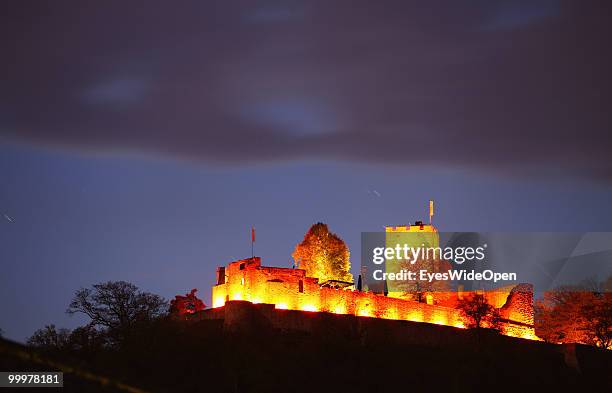 The famous Castle Landau illuminated on a hill on April 25, 2010 in Klingenmuenster, Germany. The castle was built in the 12th century by the staufer...