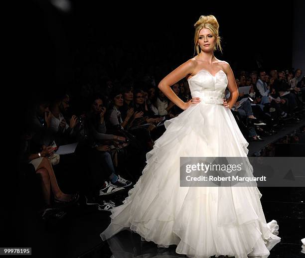 Mischa Barton presents a creation from Rosa Clara's latest bridal collection 2011, at the Fira 2 Barcelona on May 18, 2010 in Barcelona, Spain.