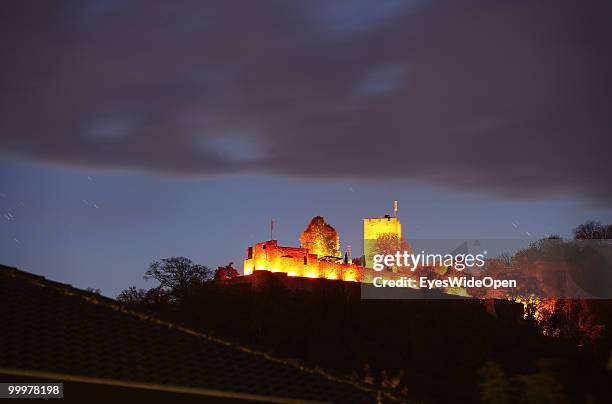 The famous Castle Landau illuminated on a hill on April 25, 2010 in Klingenmuenster, Germany. The castle was built in the 12th century by the staufer...