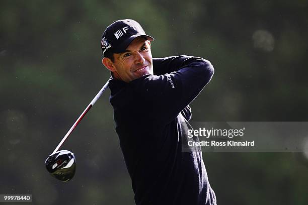 Padraig Harrington of Ireland plays a shot during the Pro-Am round prior to the BMW PGA Championship on the West Course at Wentworth on May 19, 2010...