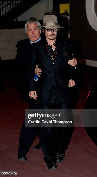 Johnny Depp is seen leaving the Chanel party this morning on May 19, 2010 in Cannes, France.