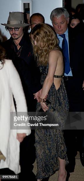 Johnny Depp and wife Vanessa Pardis are seen leaving the Chanel party this morning on May 19, 2010 in Cannes, France.