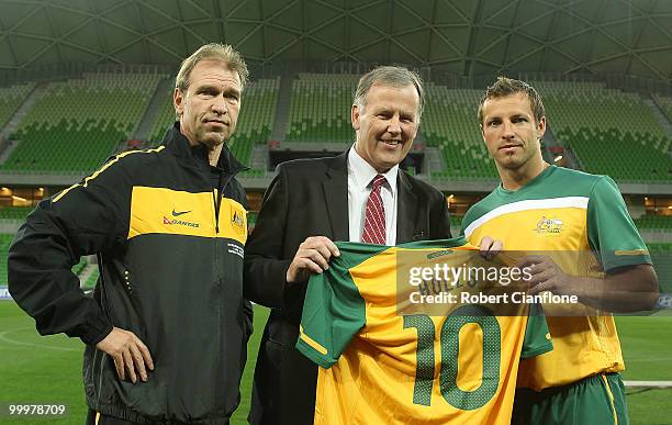 Australian coach Pim Verbeek and Australian captain Lucas Neill present Acting Premier Rob Hulls with a Socceroo shirt at the Australian Socceroos...