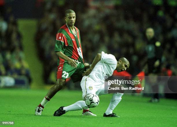 Olivier Dacourt of Leeds clashes with Daniel Kenedy of Maritimo during the Leeds United v Maritimo UEFA Cup First Round, Second Leg match at Elland...