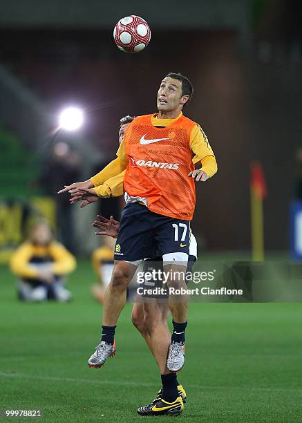Scott McDonald of Australia heads the ball during an Australian Socceroos training session at AAMI Park on May 19, 2010 in Melbourne, Australia.