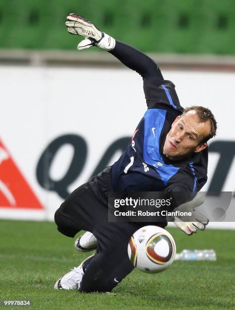 Mark Schwarzer of Australia dives for the ball during an Australian Socceroos training session at AAMI Park on May 19, 2010 in Melbourne, Australia.