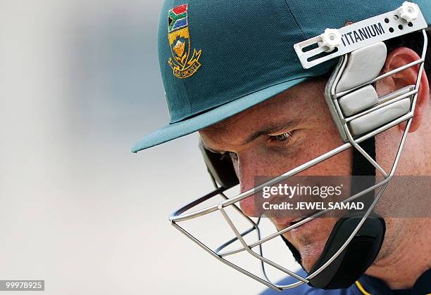 South African crickter team captain Graeme Smith arrives at the net for batting practice at the Sir Vivian Richards Stadium in St John's on May 18,...