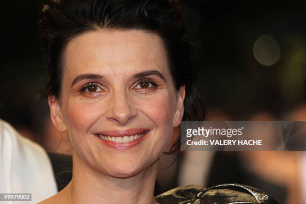 French actress Juliette Binoche arrives for the screening of "Copie Conforme presented in competition at the 63rd Cannes Film Festival on May 18,...