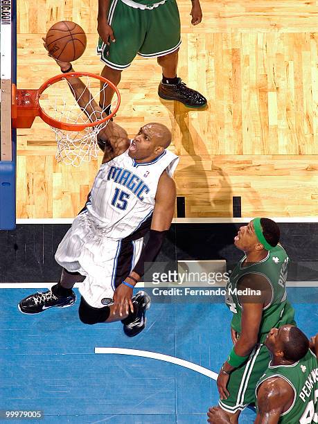Vince Carter of the Orlando Magic shoots a layup against Paul Pierce of the Boston Celtics in Game Two of the Eastern Conference Finals during the...