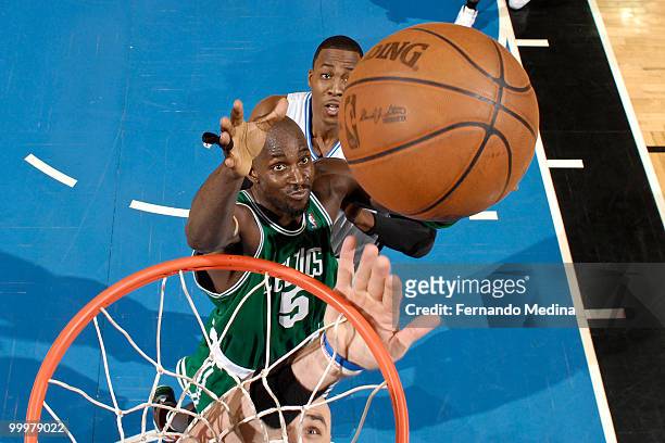 Kevin Garnett of the Boston Celtics reaches for a rebound against the Orlando Magic in Game Two of the Eastern Conference Finals during the 2010 NBA...