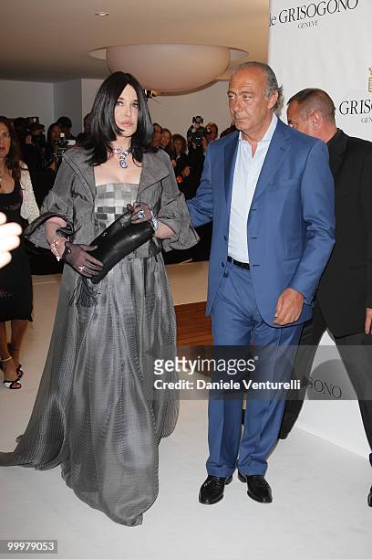 Actress Isabelle Adjani and Fawaz Gruosi attend the de Grisogono party at the Hotel Du Cap on May 18, 2010 in Cap D'Antibes, France.