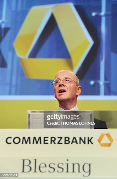 Martin Blessing, chairman of Germany's second biggest bank Commerzbank, speaks to the shareholders during the company's annual general meeting on May...
