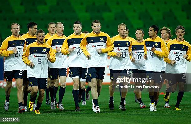 Socceroos players run laps during an Australian Socceroos training session at AAMI Park on May 19, 2010 in Melbourne, Australia.