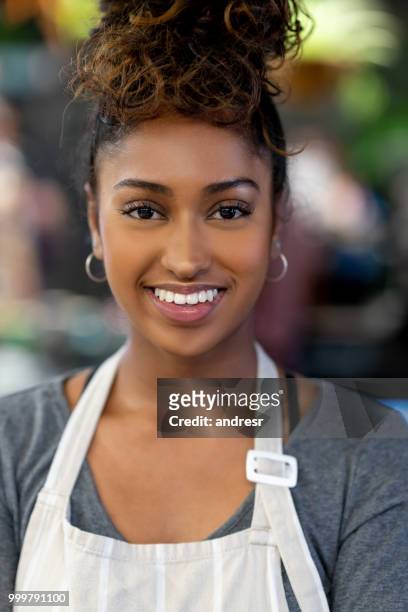 happy waitress working at a cafe - andresr stock pictures, royalty-free photos & images