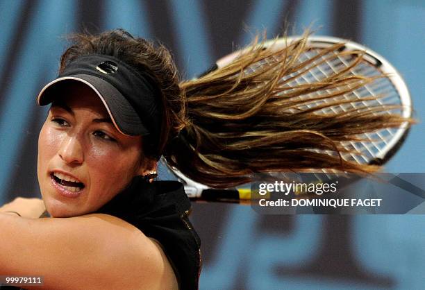 France's Aravane Rezai returns a ball Serbia's Jelena Jankovic during their Madrid Masters tennis match on May 14, 2010 at the Caja Magic sports...